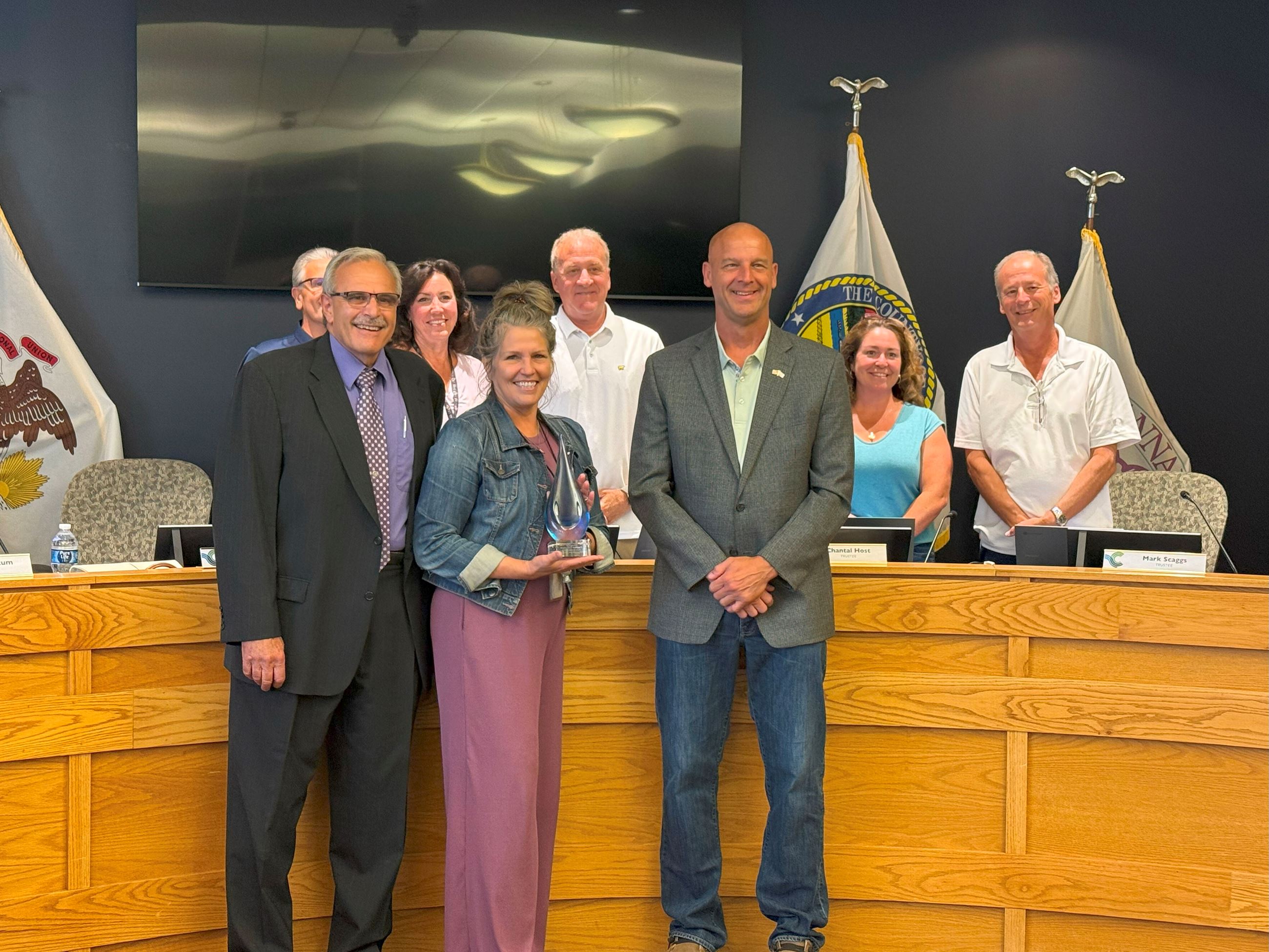 Representatives from the Village posing for a picture with the Wyland Mayor's Challenge Trophy
