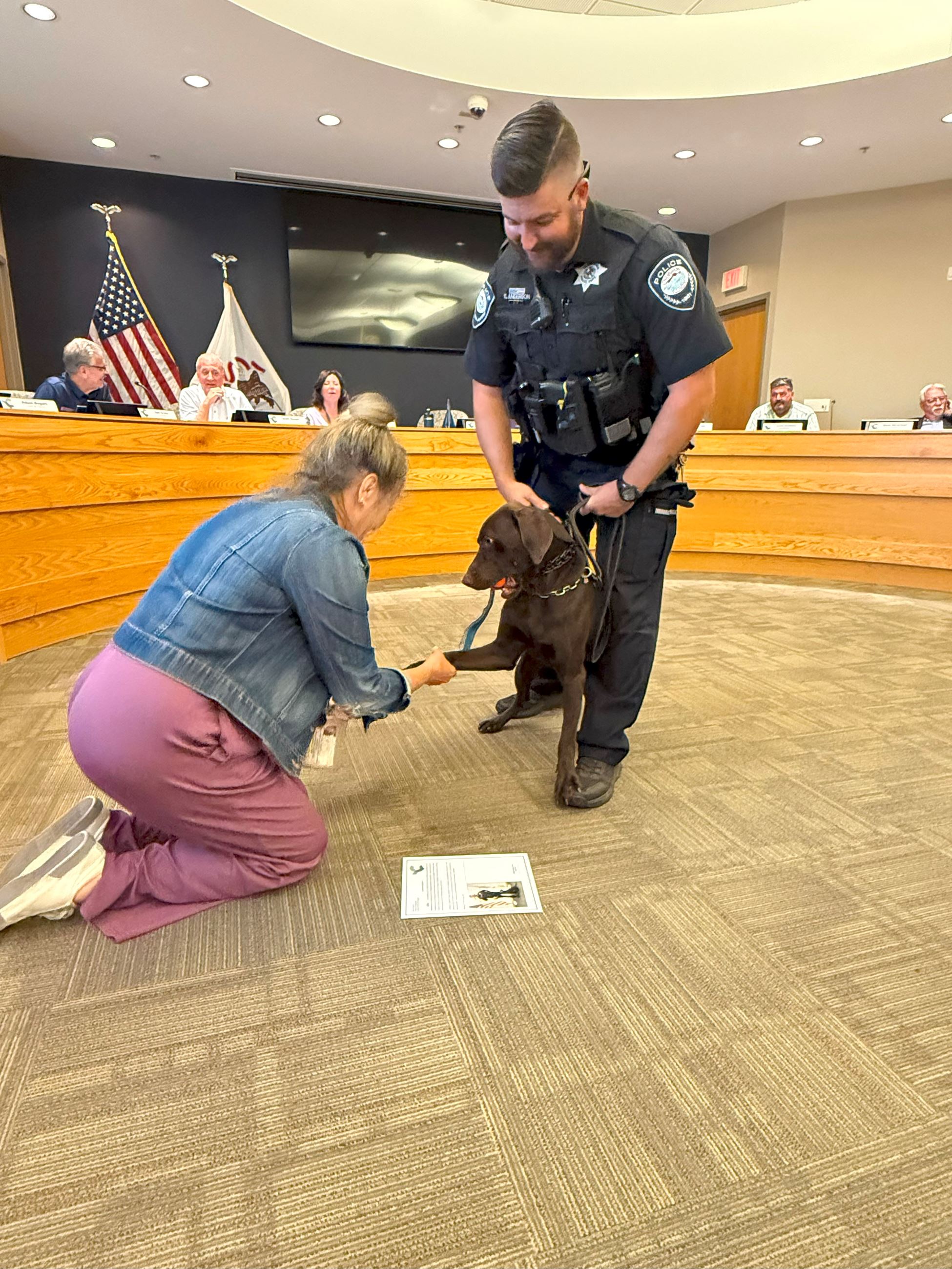 K9 Officer Atlas, handler/Officer Anderson, and Mayor Missey conducting Atlas' official swearing 